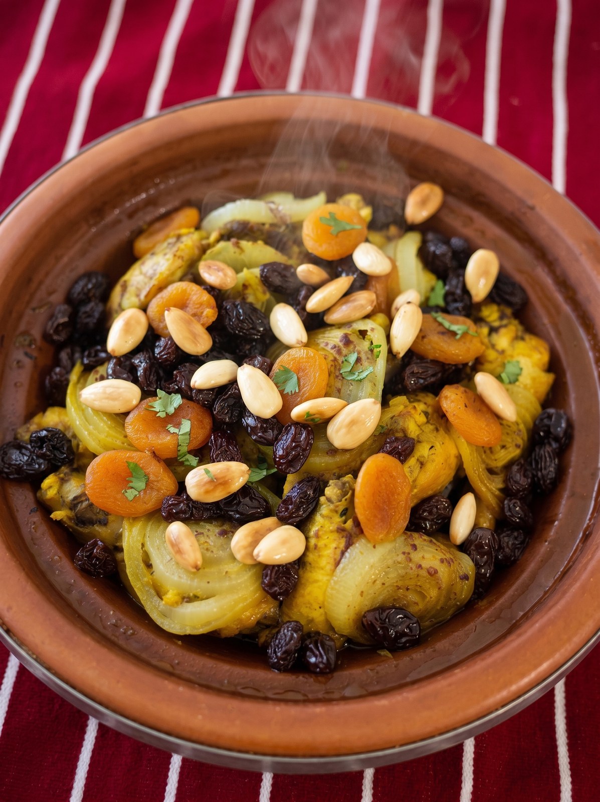 Mrouzia tagine with apricots, raisins and blanched almonds